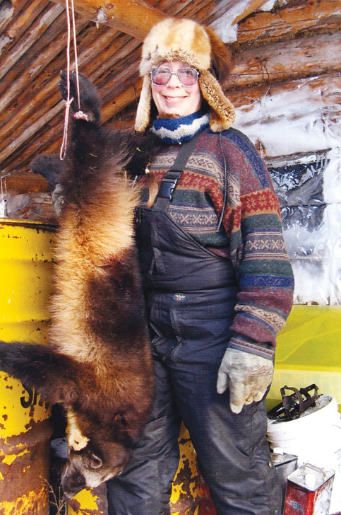 Julie Collins with a large wolverine